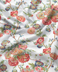Hanami White print in motion — chintz floral in coral pink, blue and sage on white