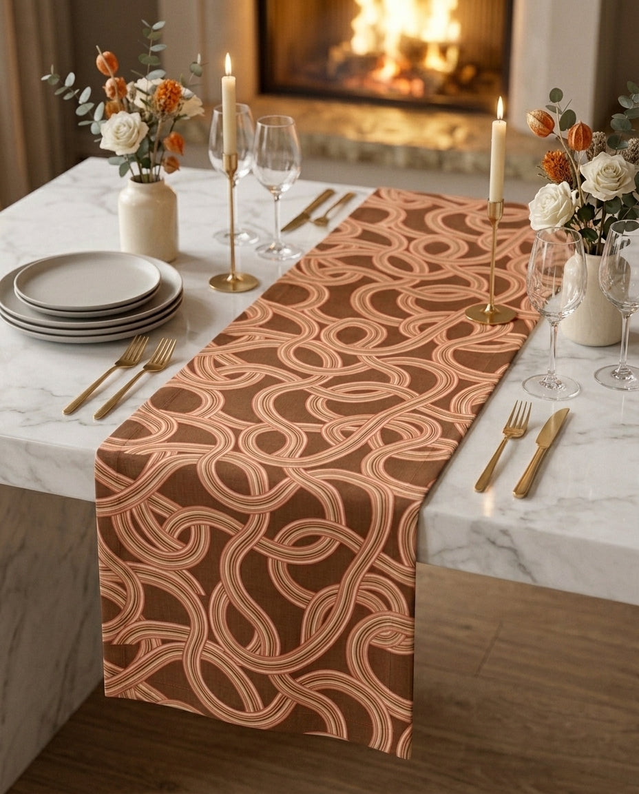 Marea gift box — table runner and matching napkin scrunchies on a white marble dining table, candlelit setting