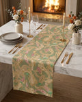 Paisley House gift box — table runner and matching napkin scrunchies on a white marble dining table, candlelit setting