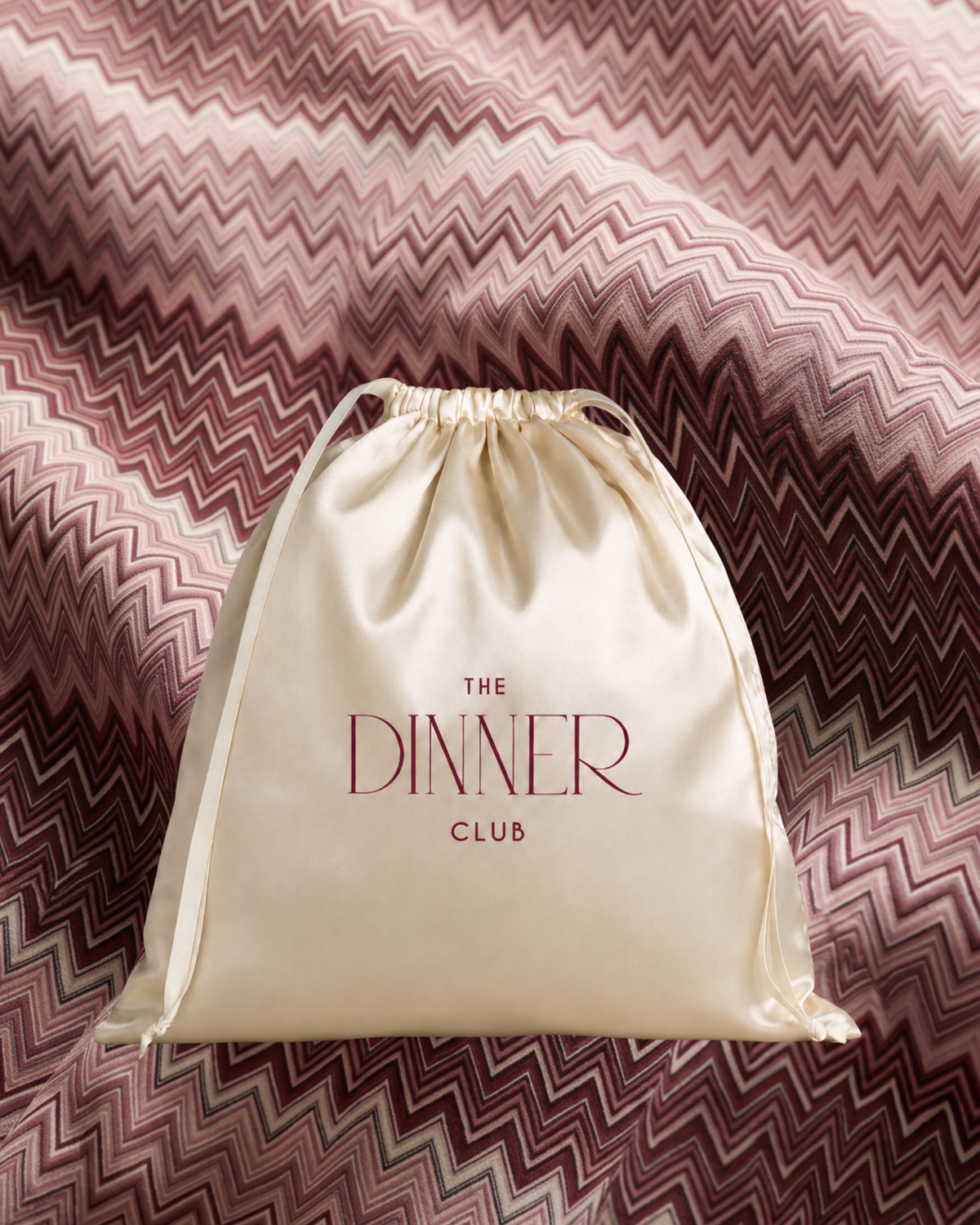 Amalfi Burgundy fabric swatch — chevron pattern in burgundy and blush