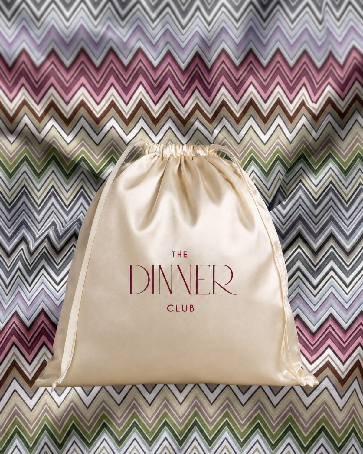Amalfi Rainbow fabric swatch — chevron bands in lilac, magenta, camel, olive and charcoal