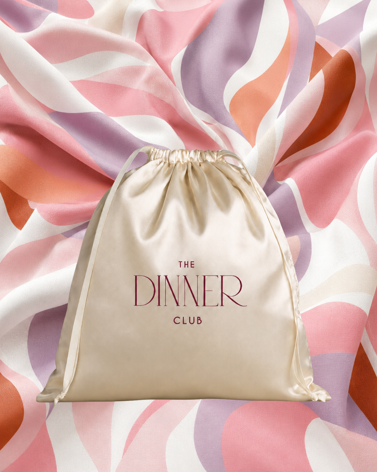 Riviera Pink fabric swatch — abstract wavy pattern in blush pink and coral