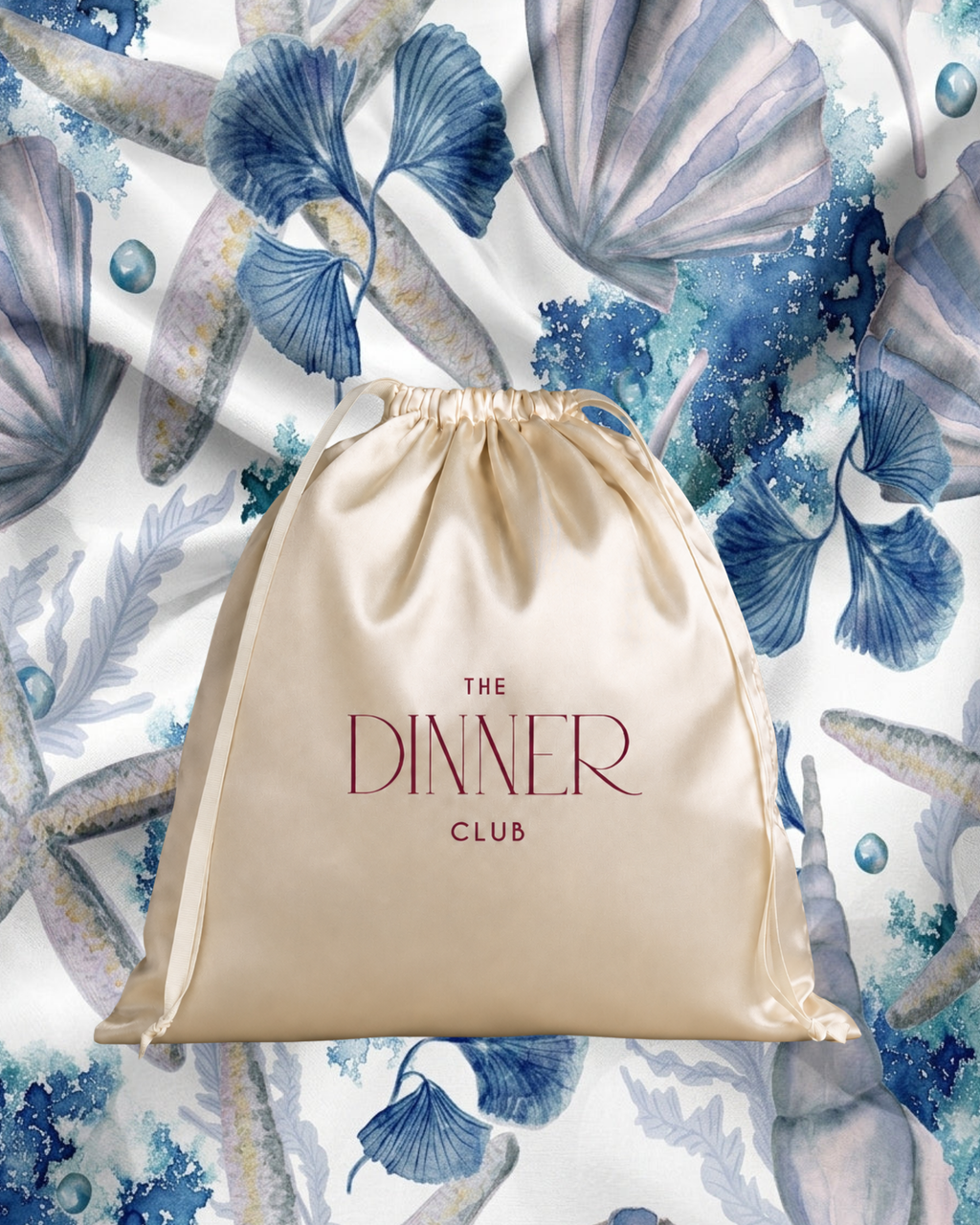 Seashell Drift fabric swatch — watercolor seashells, starfish and pearls in icy blues on white